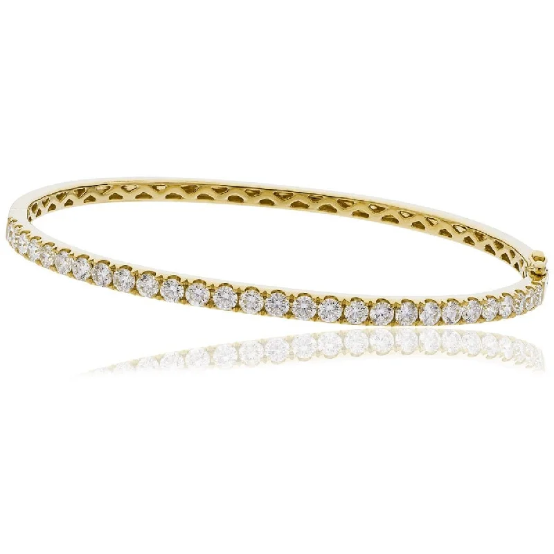 Bangles With Sapphire-DIAMOND HALF SET BANGLE IN 18K YELLOW GOLD