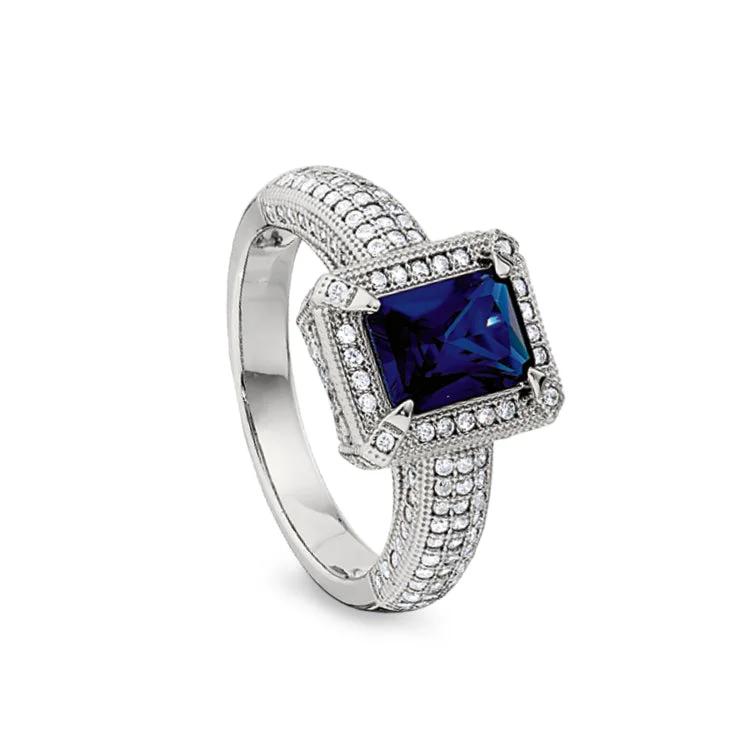 Elegant Wedding Rings-Platinum Finish Sterling Silver Micropave Emerald Cut Synthetic Blue Sapphire Ring with Simulated Diamonds