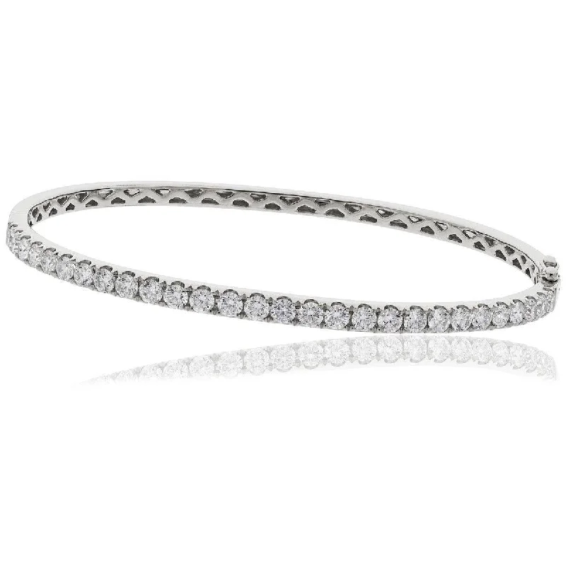 Bangles With Jade-DIAMOND HALF SET BANGLE IN 18K WHITE GOLD